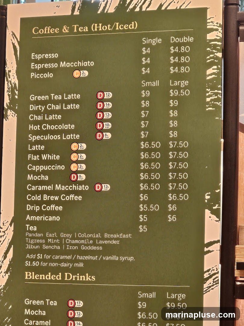 Menu featuring hot and iced coffees and teas, with options for single or double servings, and small or large sizes. Also includes blended drinks.