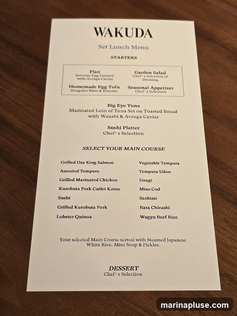 A set lunch menu from Wakuda, featuring starters, main courses, and dessert.