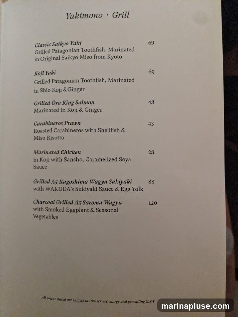 Menu items include various grilled dishes, primarily seafood and wagyu beef.