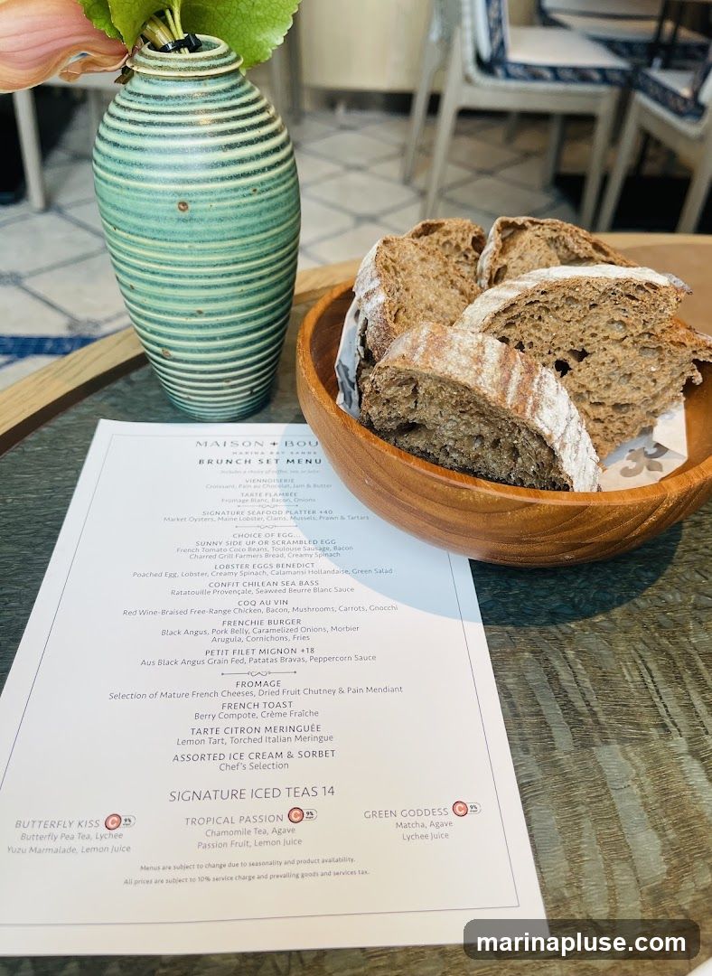 A brunch set menu with various options for eggs, seafood, meat, cheese, and dessert. It also features signature iced teas.