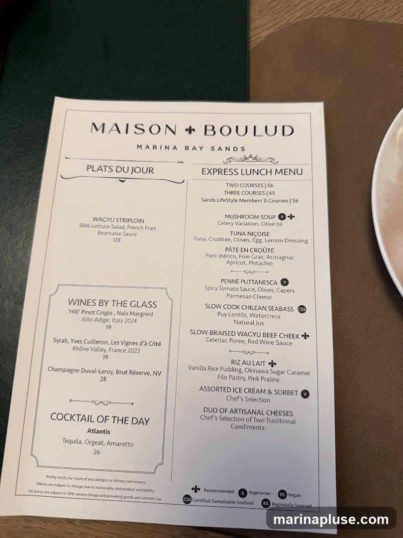 Menu from Maison Boulud at Marina Bay Sands offering an Express Lunch Menu with two or three courses, as well as Plats du Jour, Wines by the Glass, and a Cocktail of the Day.