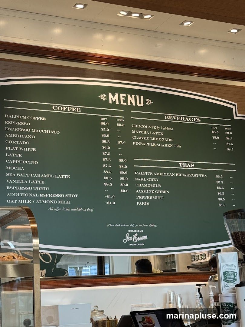 A menu board displaying coffee, beverages, and teas.