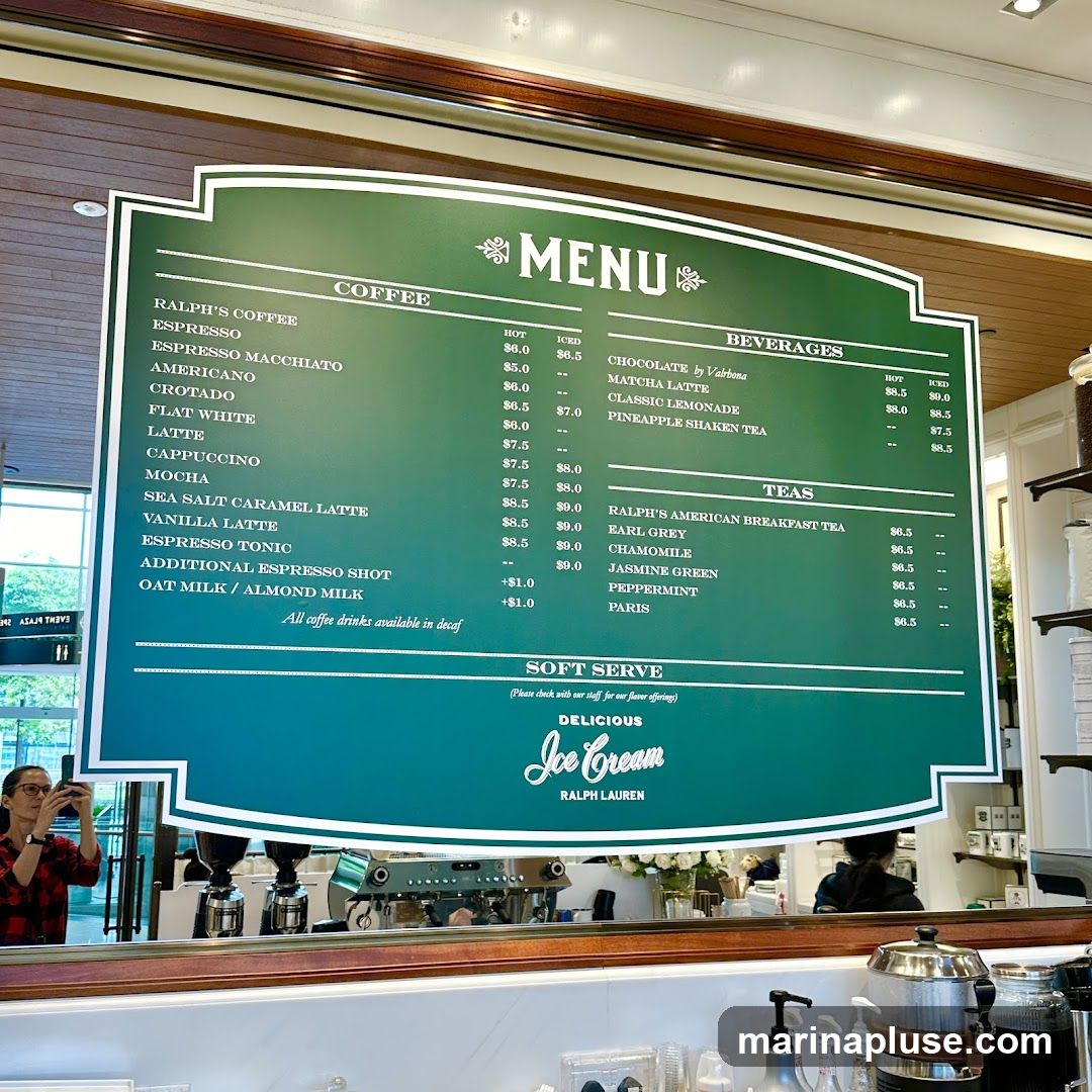 A green menu board with white text displays coffee, beverages, and tea options. Below the main menu, there is a section for soft serve ice cream.