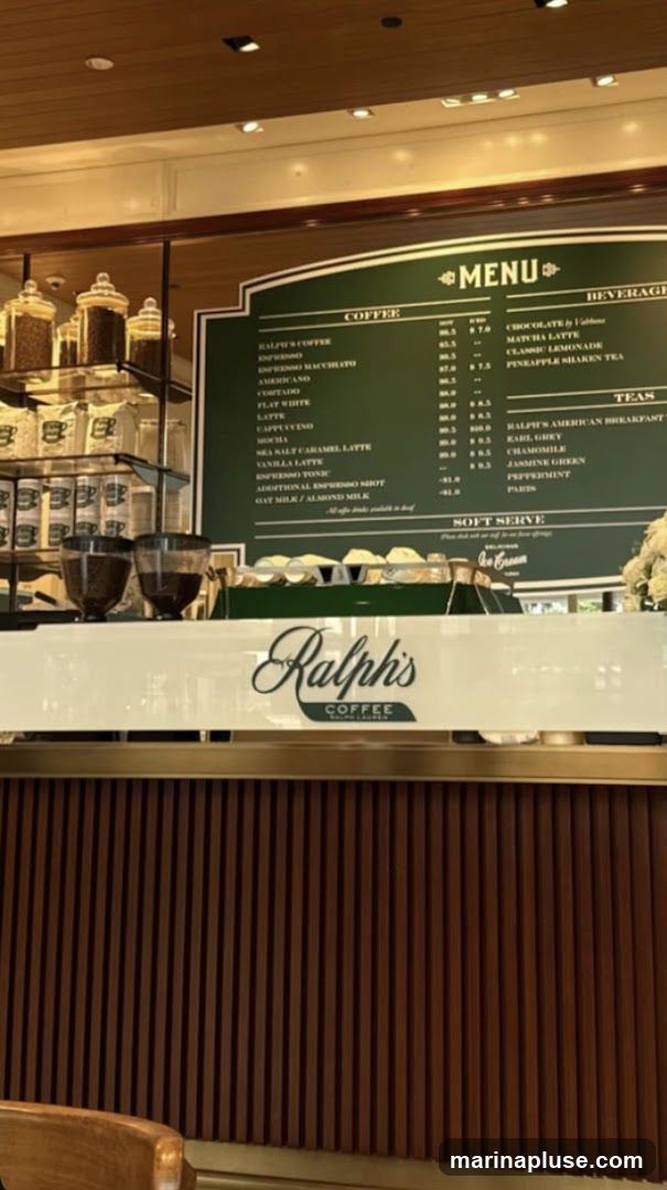 A menu board displaying coffee, beverages, and teas.