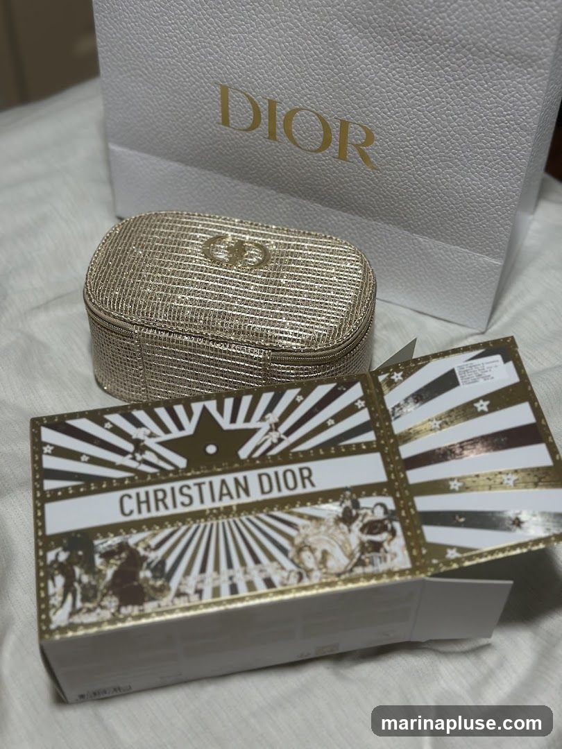 A gold, textured cosmetic bag with the Dior logo sits in front of a white Dior shopping bag. In the foreground is an open Dior product box with a festive, starburst design and the text "CHRISTIAN DIOR" prominently displayed.