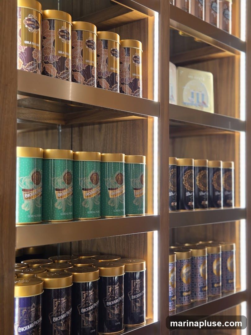 Shelves filled with various canned goods, primarily tea or coffee, with decorative labels. The cans are arranged in rows and columns, illuminated by vertical LED lights.