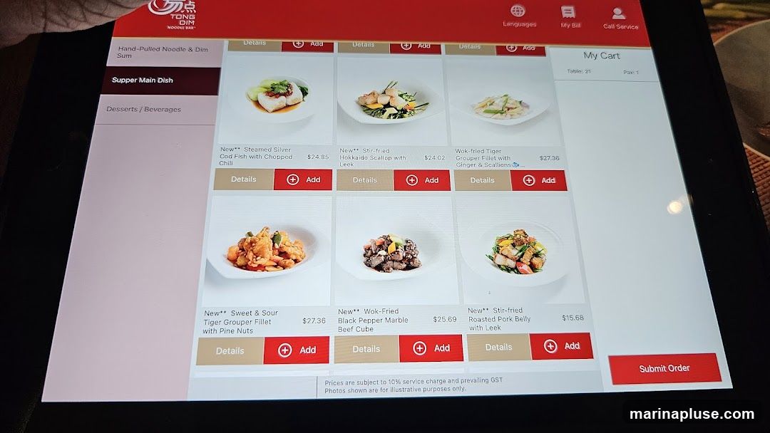 A digital menu displaying various main dishes with images, descriptions, prices, and options to add to cart.