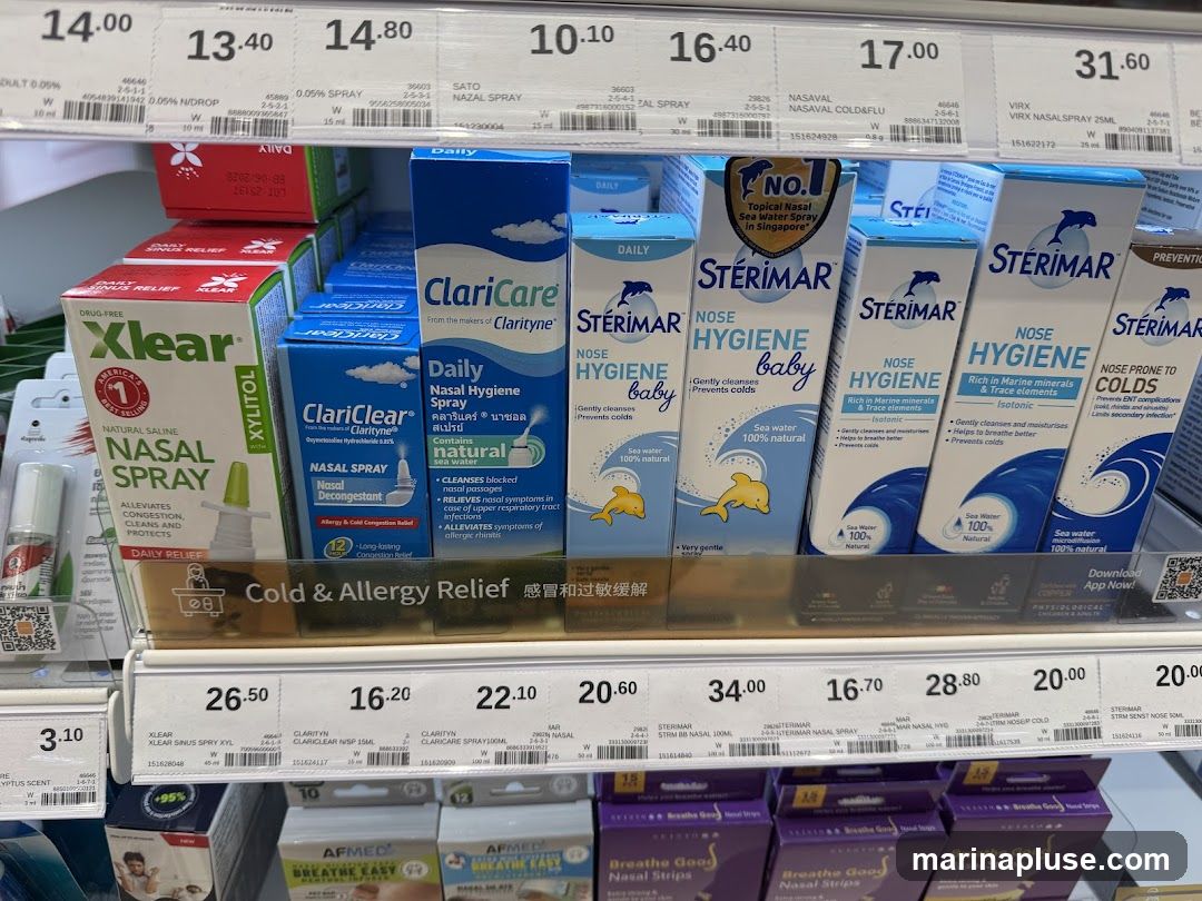 A shelf display of various nasal sprays and saline solutions for cold and allergy relief. Brands include Xlear, ClariCare, and Sterimar. Prices are visible for several products.
