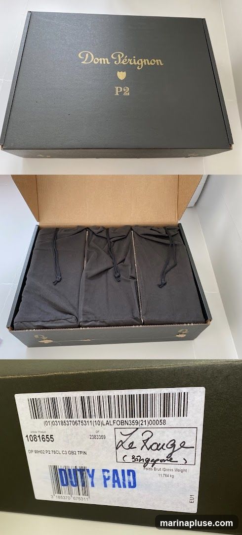 A dark green gift box for Dom Pérignon P2 champagne. The lid is closed and features the Dom Pérignon logo and "P2" in gold lettering. The box is open in the second image, revealing three dark cloth bags inside, presumably containing bottles. The third image shows a label on the side of the box with product information, a handwritten note "Le Rouge (Singapore)", and a "DUTY PAID" stamp.