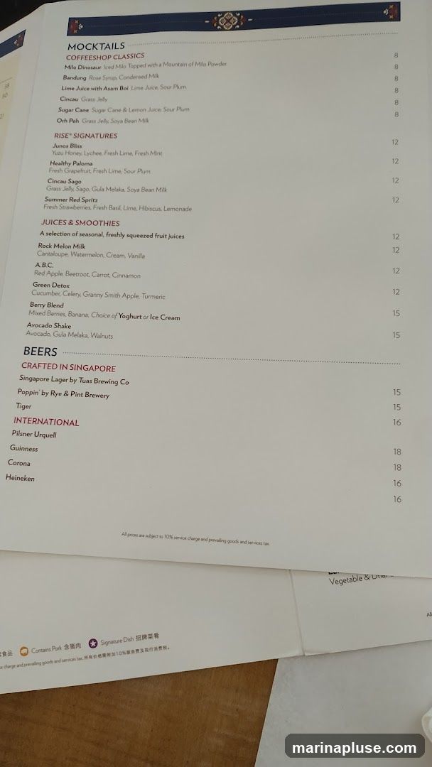 A menu featuring mocktails, juices & smoothies, and beers.