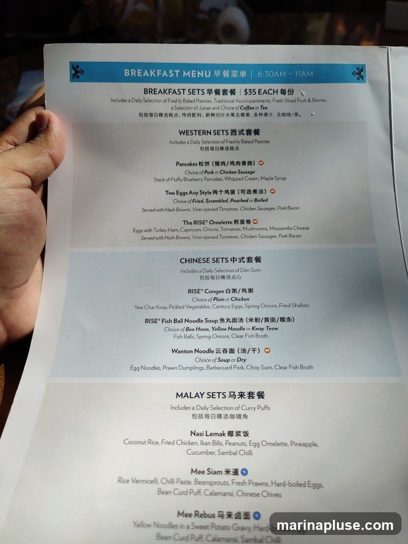 Breakfast sets available from 6:30 AM to 11 AM. Sets include pastries, fruit, juice, and coffee or tea. Options include Western, Chinese, and Malay sets.