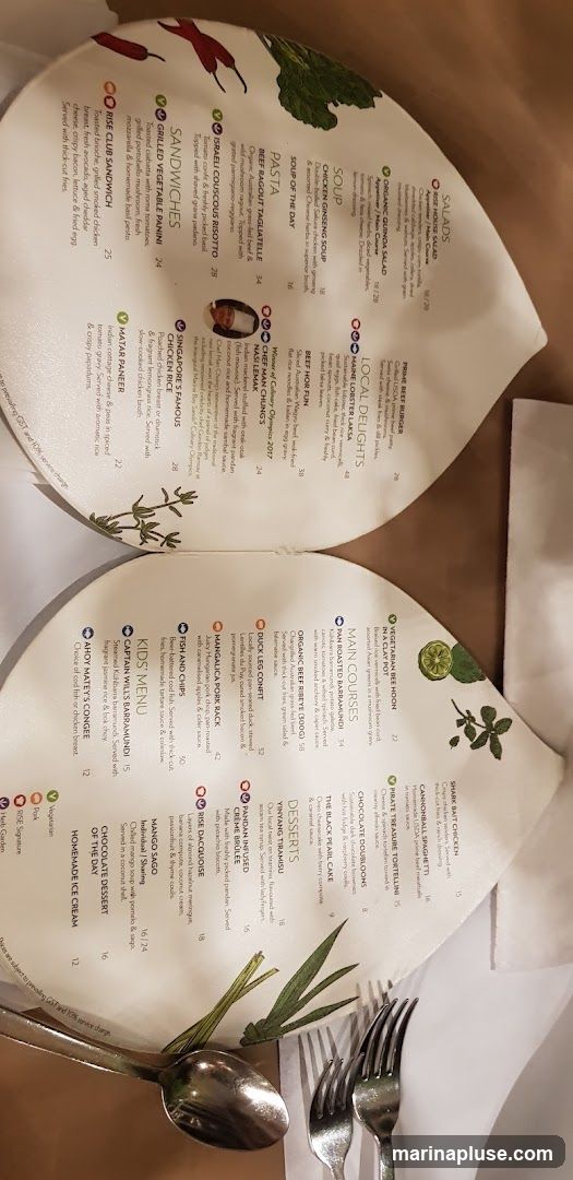 A menu with various sections including Salads, Soups, Pasta, Sandwiches, Local Delights, Main Courses, Kids' Menu, and Desserts.