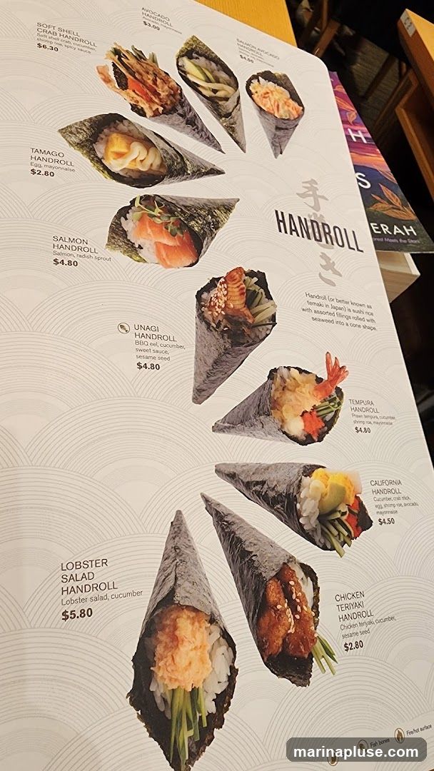 A menu featuring various handrolls with descriptions and prices.