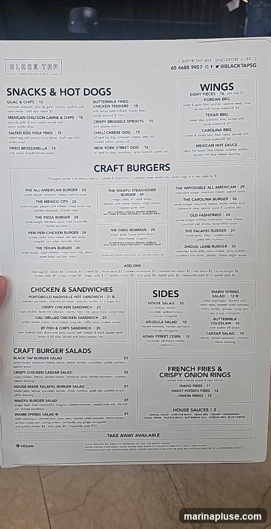 Menu with sections for Snacks & Hot Dogs, Craft Burgers, Chicken & Sandwiches, Craft Burger Salads, Sides, Wings, French Fries & Crispy Onion Rings, and House Sauces.