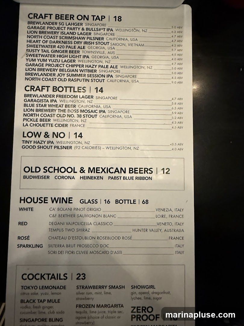 A menu with sections for Craft Beer on Tap, Craft Bottles, Low & No, Old School & Mexican Beers, House Wine, and Cocktails.