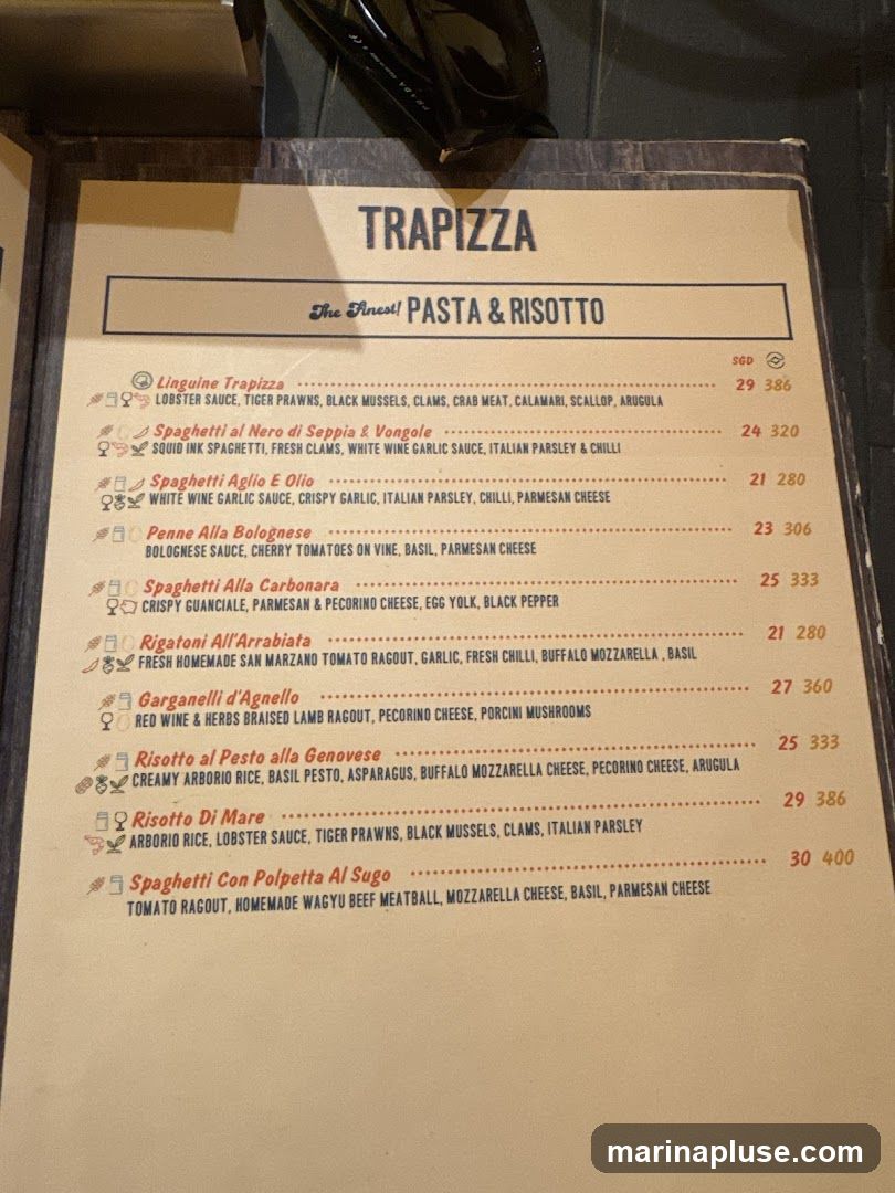 Menu featuring pasta and risotto dishes with descriptions and prices.