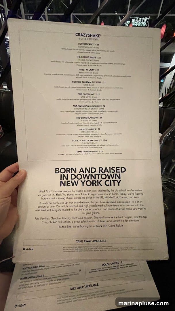 A menu featuring CrazyShakes, burgers, salads, and house sauces.