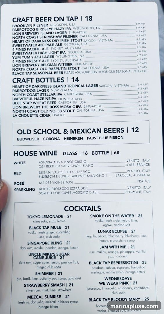 A menu with sections for Craft Beer on Tap, Craft Bottles, Old School & Mexican Beers, House Wine, and Cocktails.