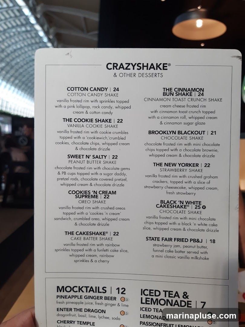 Menu featuring various shakes, mocktails, and iced tea/lemonade options.