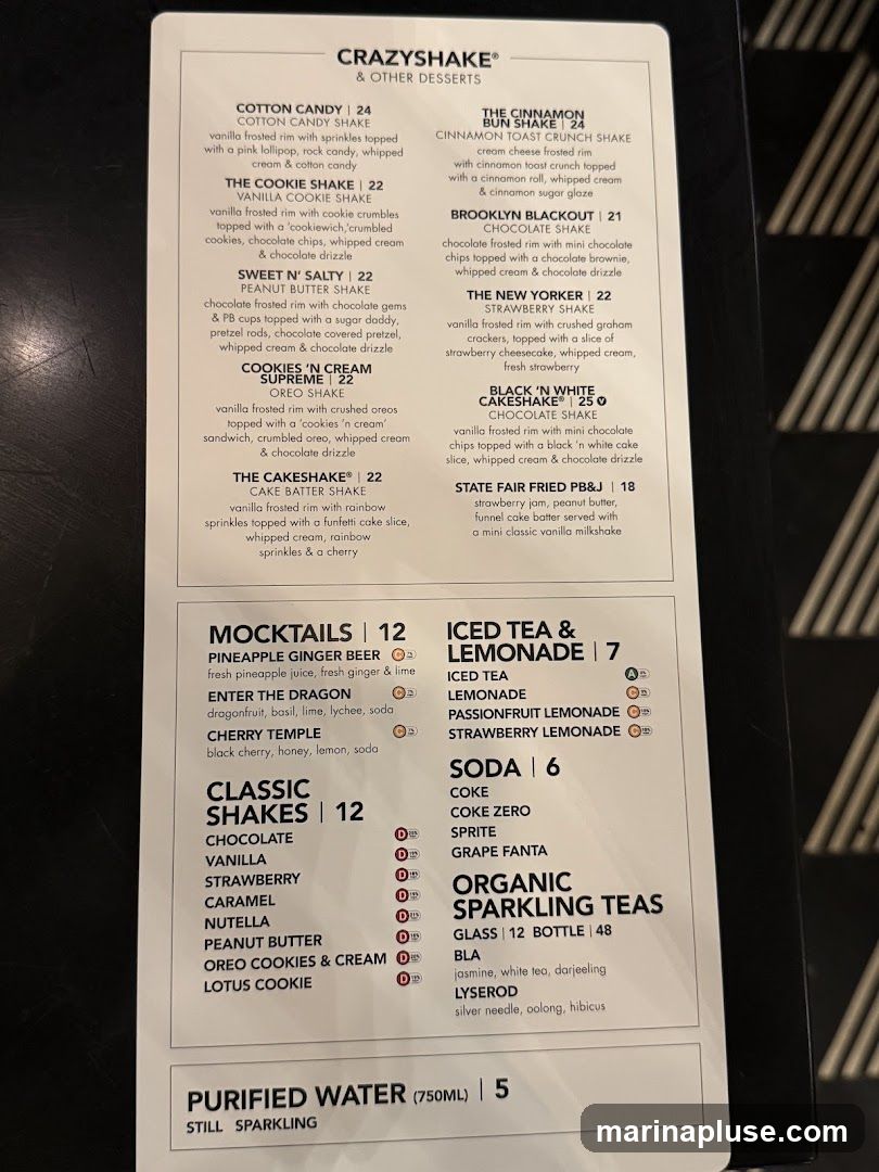 Menu featuring various shakes, mocktails, iced teas, sodas, organic sparkling teas, and purified water.