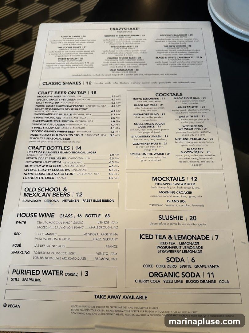 Menu featuring milkshakes, classic shakes, craft beer, craft bottles, old school & Mexican beers, house wine, purified water, cocktails, mocktails, slushies, iced tea & lemonade, soda, and organic soda.