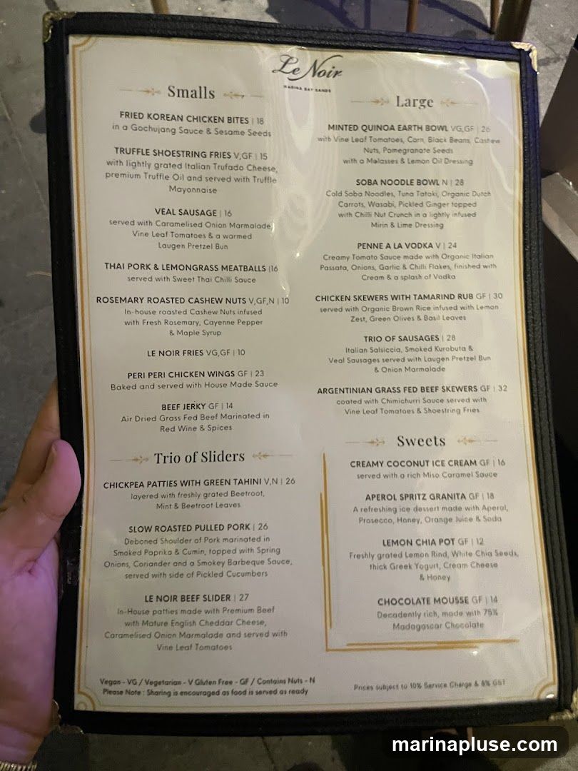 A menu from Le Noir with sections for Smalls, Large, and Sweets.