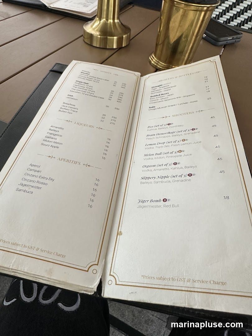 A menu with sections for Spirits, Liqueurs, Aperitifs, Beers of Bottles, and Shooters.