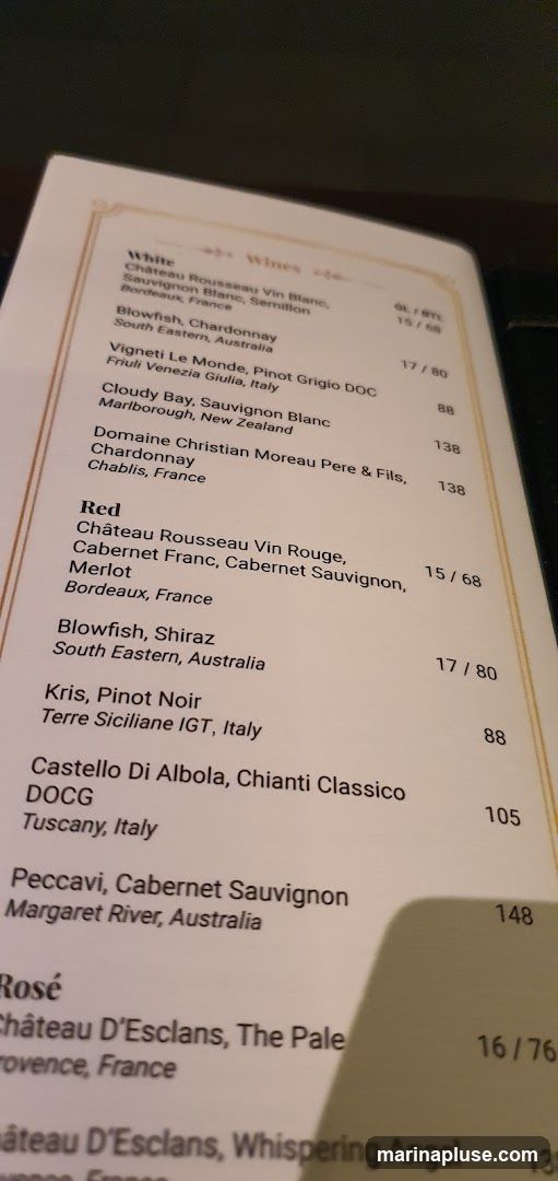 A wine list with sections for White, Red, and Rosé wines.