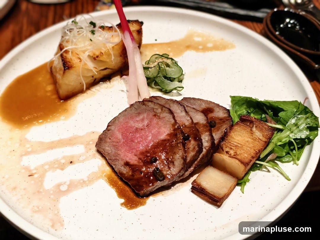 A white plate holds a serving of sliced roast beef, glistening with a dark sauce and peppercorns. To the left, a piece of pan-seared fish or tofu sits in a pool of light brown sauce, topped with shredded white garnish and a pink-stemmed vegetable. A small pile of thinly sliced pickled cucumbers is also present. To the right of the beef are two pieces of crispy fried potato and a small salad of green leaves. The plate has a speckled pattern.