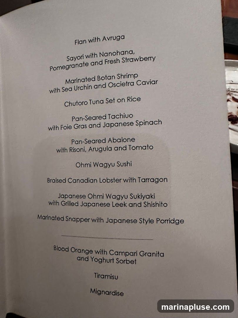 A menu with several dishes listed, including seafood, wagyu beef, and desserts.