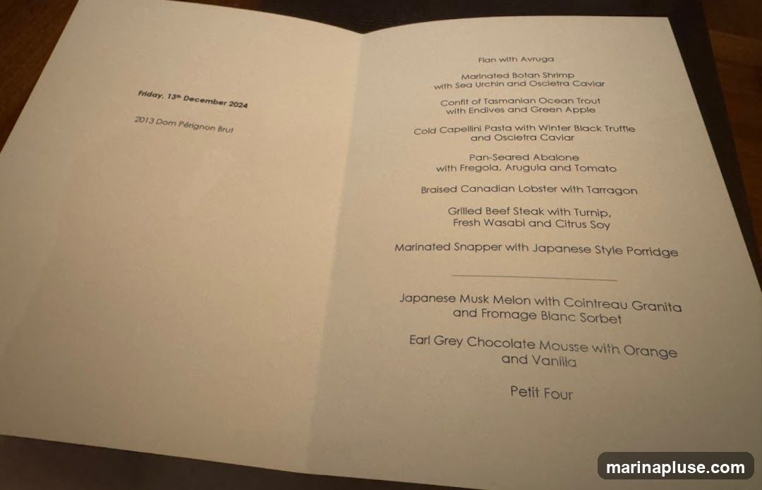 A menu dated Friday, 13th December 2024, featuring a 2013 Dom Pérignon Brut. The menu lists several dishes including seafood, pasta, steak, and dessert.
