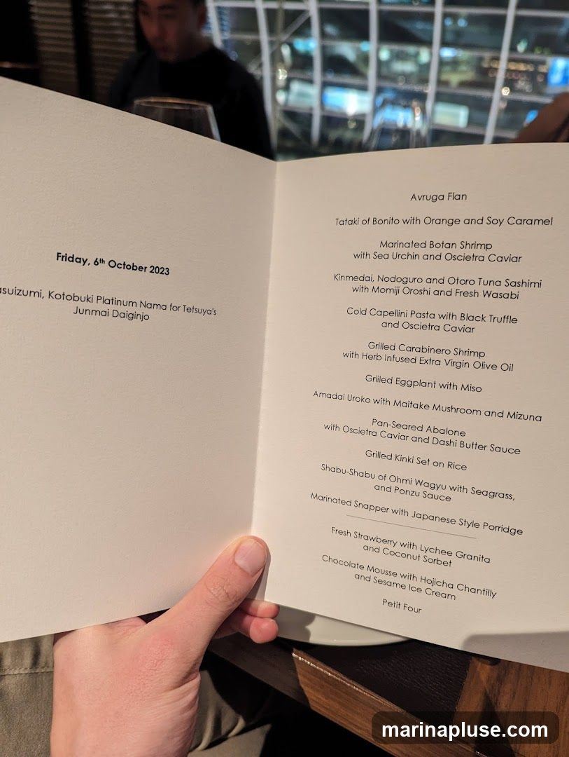 A menu for Friday, 6th October 2023, featuring a tasting menu with various seafood and meat dishes, as well as desserts.