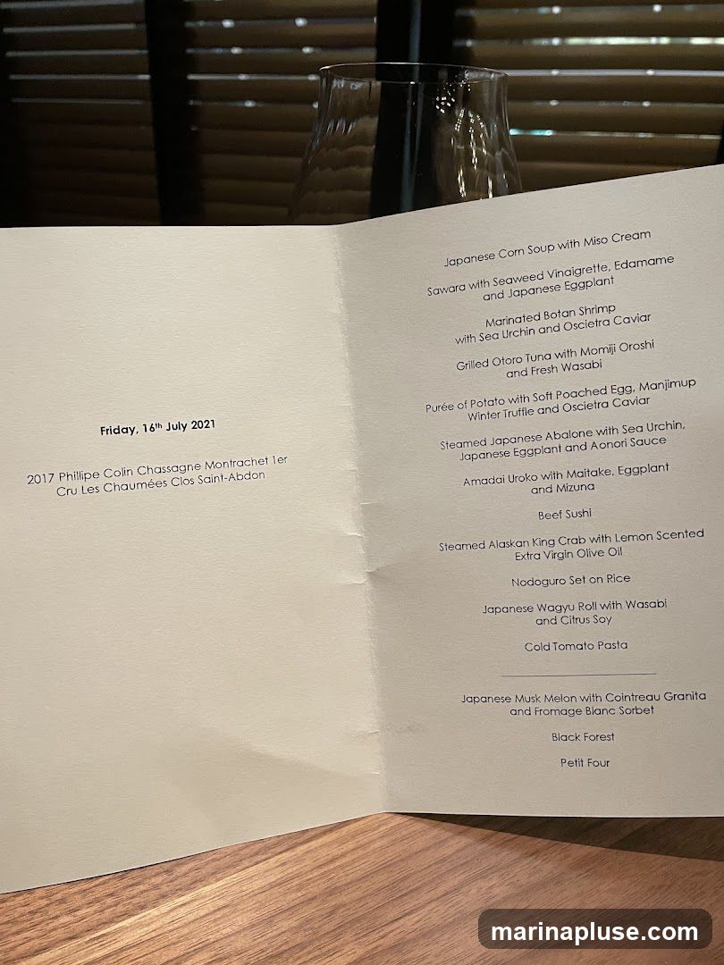 A menu from Friday, 16th July 2021, featuring a selection of Japanese-inspired dishes and wine pairings.