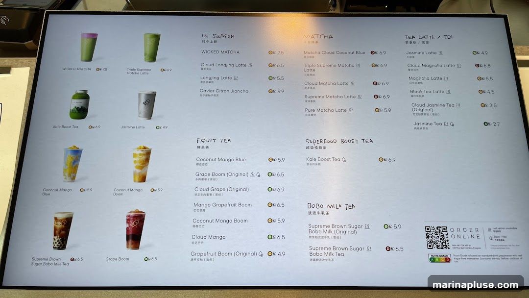 A digital menu displaying various tea and beverage options categorized into In Season, Matcha, Tea Latte/Tea, Fruit Tea, Superfood Boost Tea, and Bobo Milk Tea. Each item includes a name, and some have additional icons indicating potential customization or dietary information. Prices are listed in a currency symbol that appears to be 'Q'.
