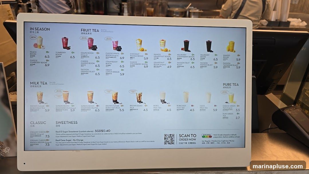 A digital menu displaying various fruit teas, milk teas, and pure teas. It also includes options for sweetness levels and ice preferences.