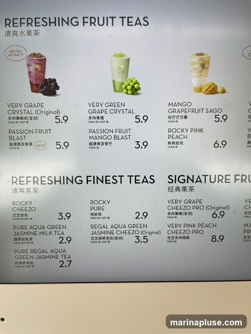 Menu featuring various fruit teas and signature fruit teas.