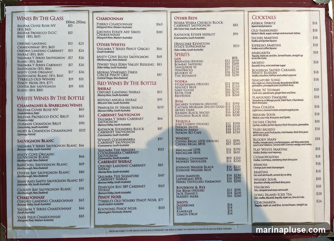 Menu with sections for Wines by the Glass, White Wines by the Bottle, Red Wines by the Bottle, Other Reds, Spirits, Cocktails, and Shots.