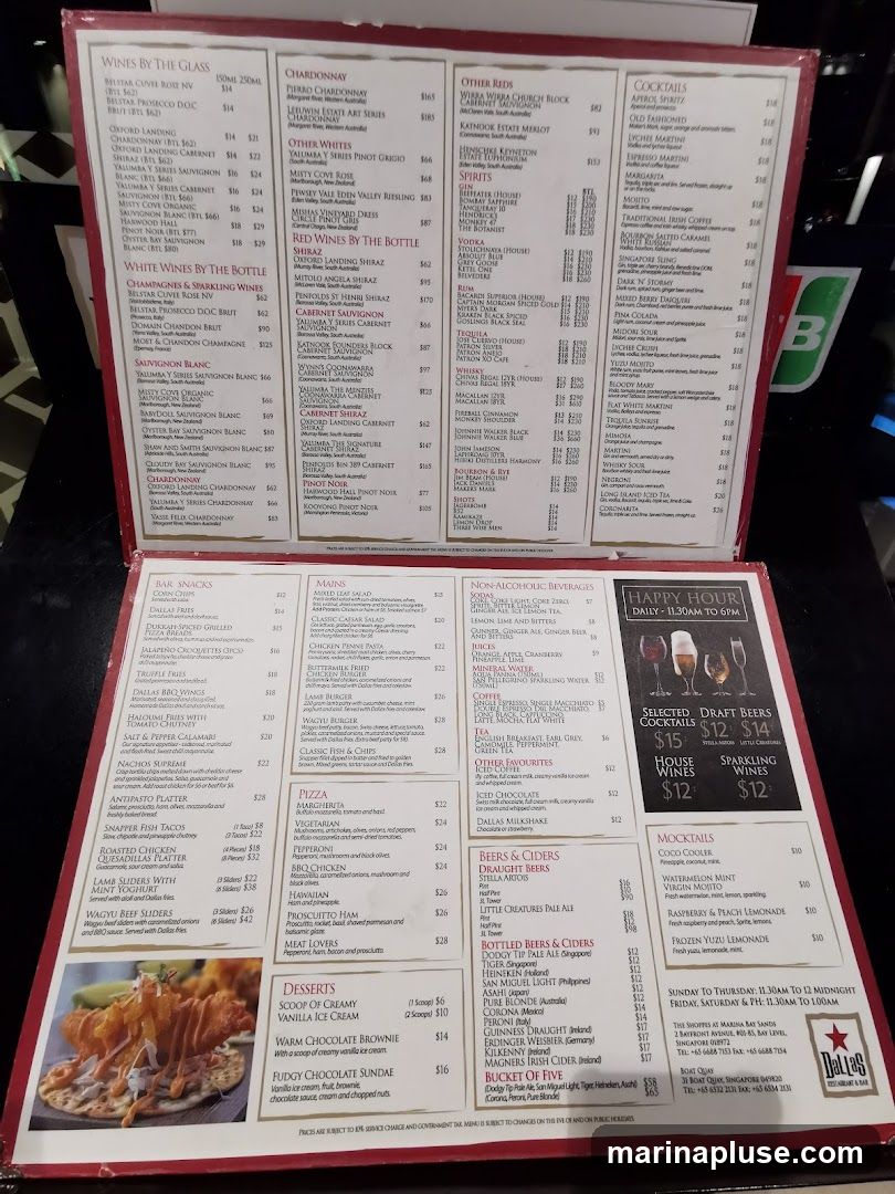 A menu with sections for wines, spirits, cocktails, bar snacks, mains, non-alcoholic beverages, desserts, beers, ciders, and mocktails.