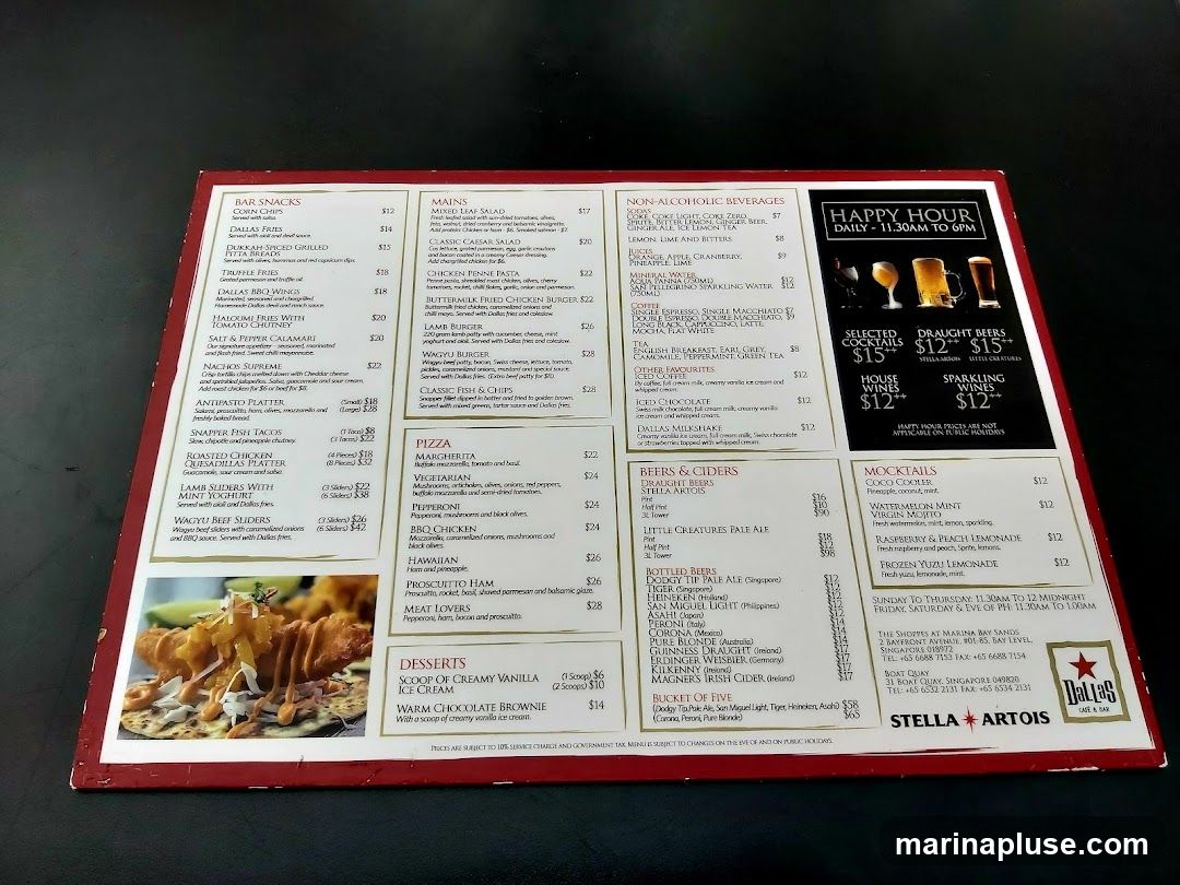 A menu with sections for Bar Snacks, Mains, Pizzas, Desserts, Non-Alcoholic Beverages, Beers & Ciders, Mocktails, and Happy Hour specials. The menu also includes contact information for two locations in Singapore.