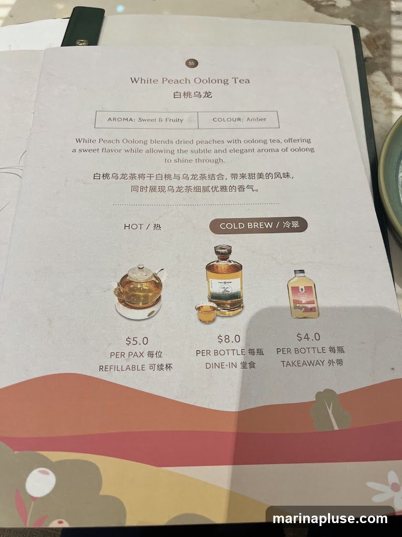 A description of White Peach Oolong tea, noting its aroma as sweet & fruity and color as amber. It is described as blending dried peaches with oolong tea for a sweet flavor and subtle, elegant aroma.