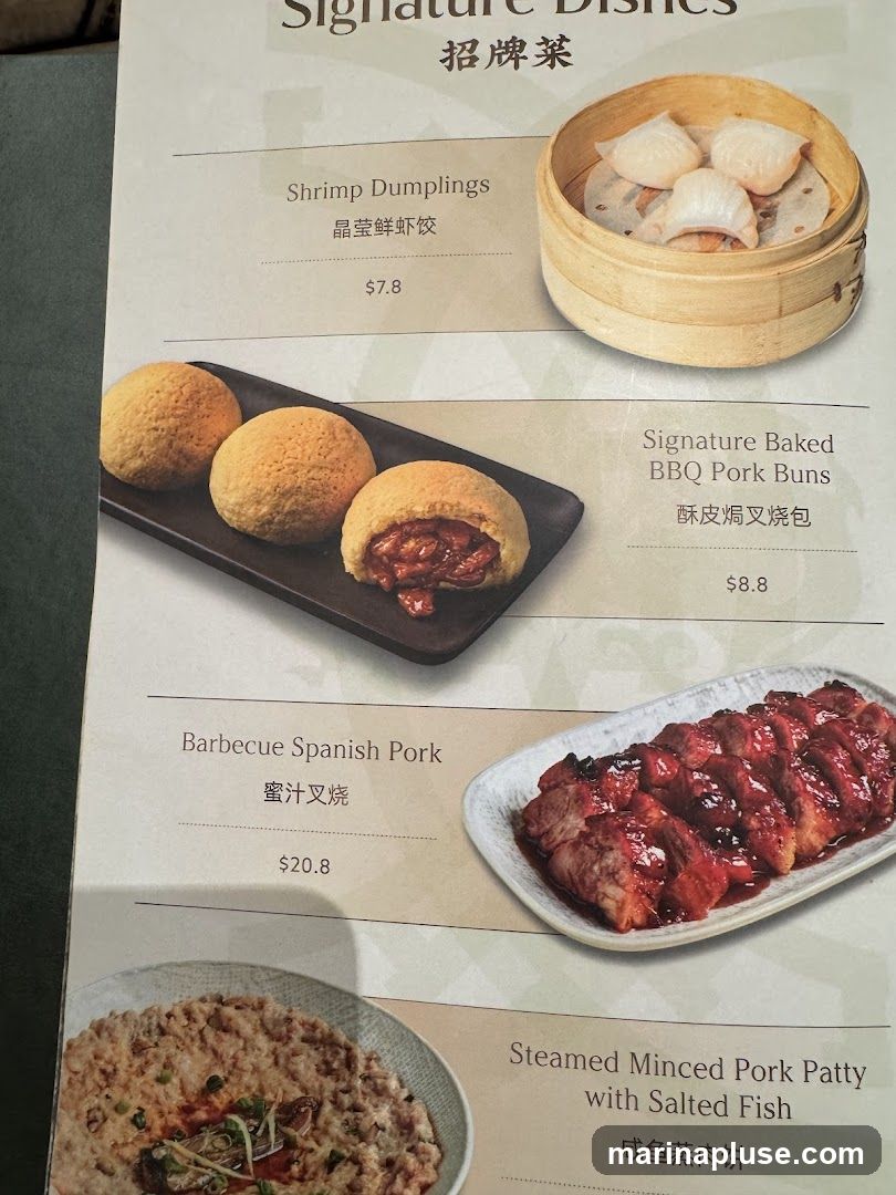 A menu page featuring several signature dishes with accompanying images and prices.