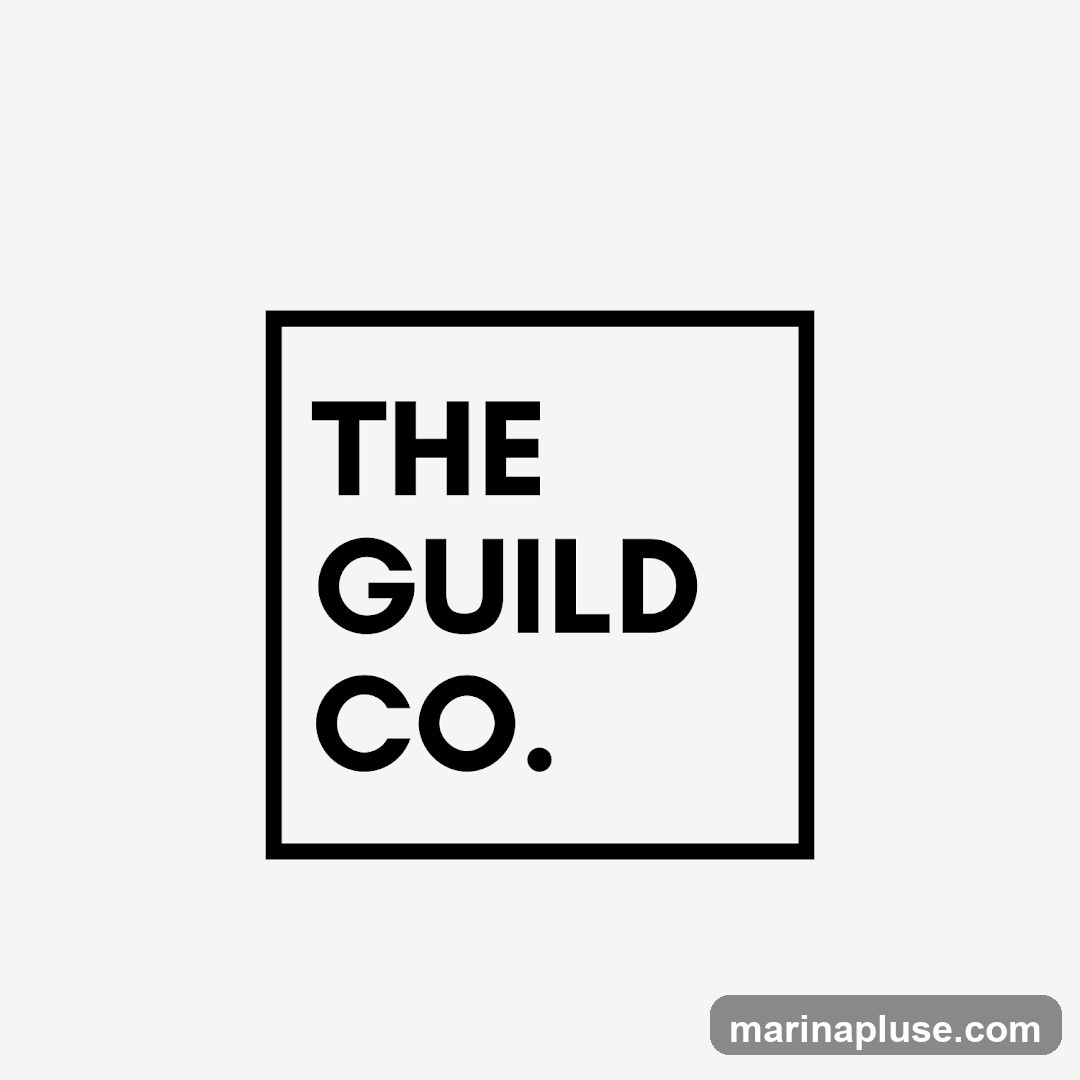 A black and white logo with the text "THE GUILD CO." inside a black square.