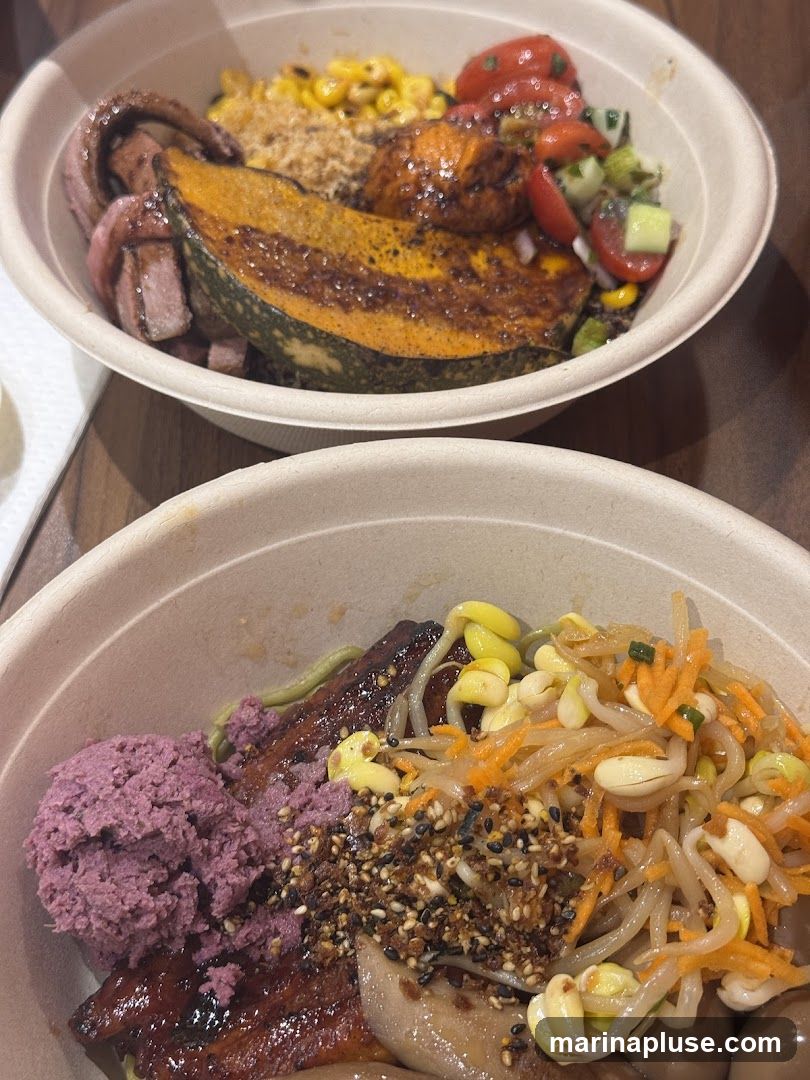 Two bowls of food are shown. The top bowl contains roasted pumpkin, corn, tomatoes, cucumbers, and meat. The bottom bowl contains purple mashed food, grilled meat, bean sprouts, shredded carrots, and eggs.