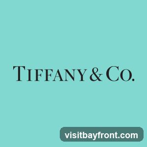 The Tiffany & Co. logo is displayed in black text on a teal background.