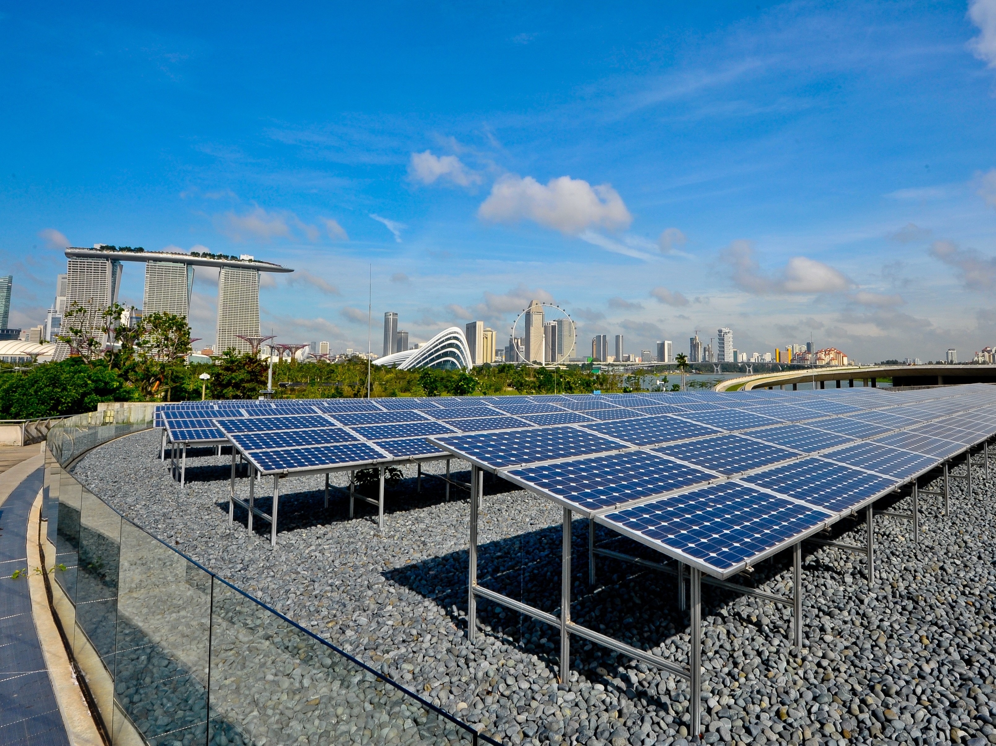 Solar arrays on the Marina Barrage Green Roof looking toward Marina Bay Sands and ArtScience Museum